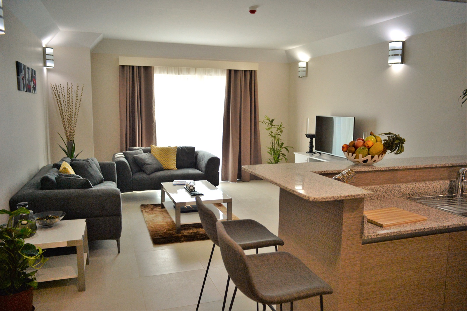 Spacious furnished living area at Tilal Towers