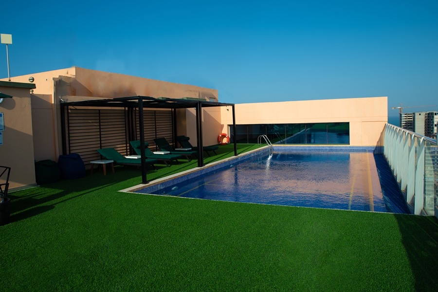 Rooftop pool view at Tilal Towers